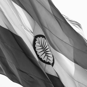 India flag flying at Connaught Place with pride in blue sky, India flag fluttering, Indian Flag on Independence Day and Republic Day of India, waving Indian flag, Flying India flags - Black and White photo