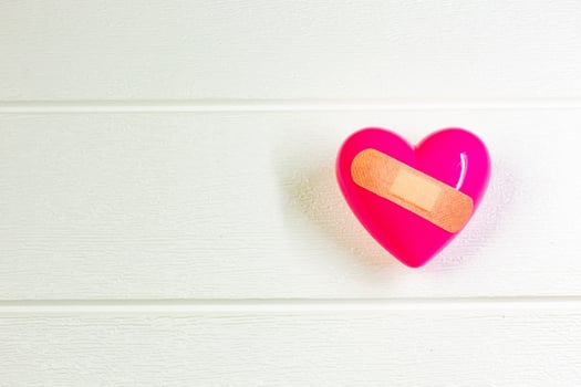 pink Heart and hand for medical content. photo