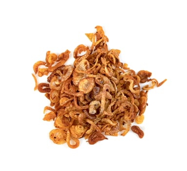 Fried red onions isolated on white background photo