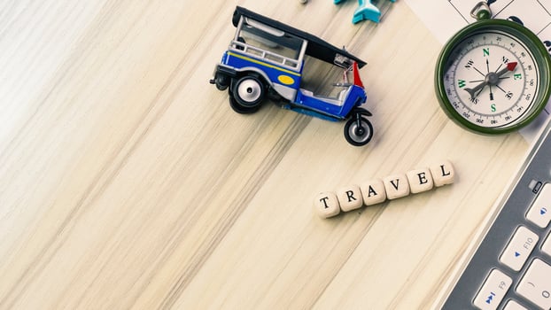 tuktuk on white  office  table for travel content. photo