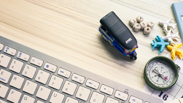 tuktuk on white  office  table for travel content. photo