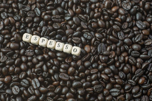 coffee roasted and text wood cube close up image. photo