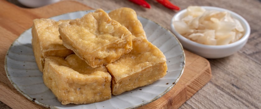 Deep fried stinky tofu with pickled cabbage street food in Taiwan. photo