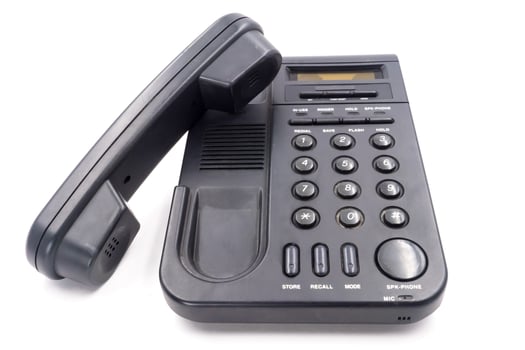 Black telephone on white background photo
