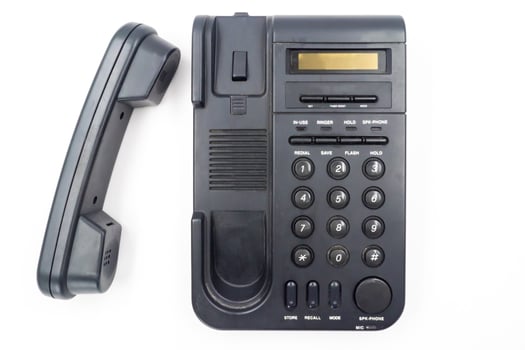 Black telephone on white background photo