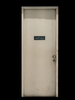 Staff only sign on a old door. photo