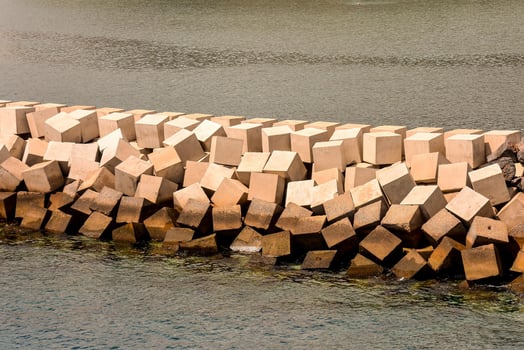 a wall of blocks in the water photo