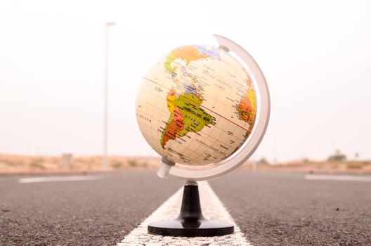 Globe on the road photo