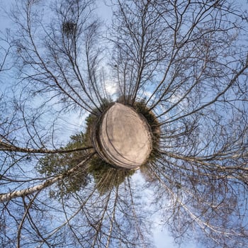 Little planet transformation of spherical panorama 360 degrees. Spherical abstract aerial view in field with awesome beautiful clouds. Curvature of space. photo