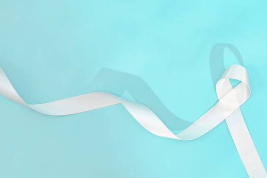 lung cancer awareness month with white ribbon. Healthcare and medicine concept. photo