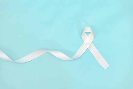 lung cancer awareness month with white ribbon. Healthcare and medicine concept. photo