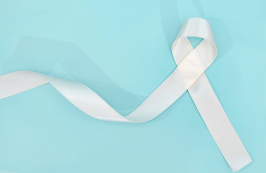lung cancer awareness month with white ribbon. Healthcare and medicine concept. photo