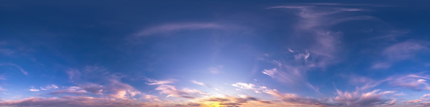 dark blue sky before sunset with beautiful clouds. Seamless hdri panorama 360 degrees angle view with zenith for use in 3d graphics or game development as sky dome or edit drone shot photo