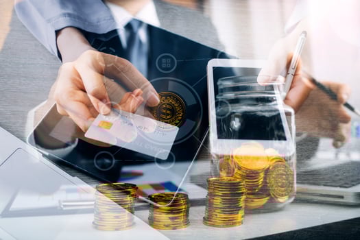 Hands holding credit card and using laptop. Online shopping photo