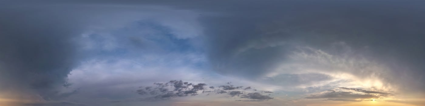 dark blue sky before sunset with beautiful awesome clouds before storm. Seamless hdri panorama 360 degrees angle view with zenith for use in graphics or game development as sky dome or edit drone shot photo