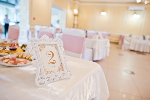 Number two at wedding table in restaurant. photo