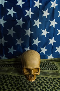 The  united states of America flag and Shemagh  and skull abstract background. photo