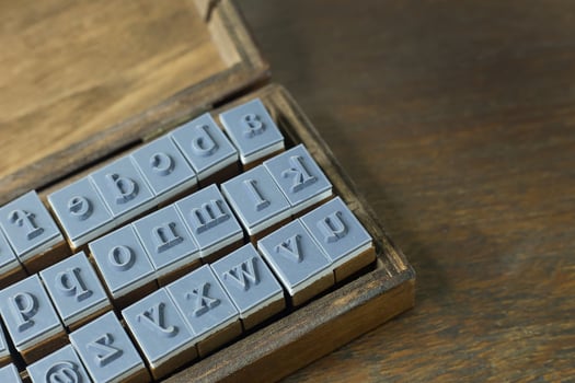 wood stamp alphabet close up image for background. photo
