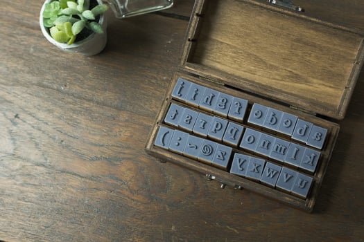 wood stamp alphabet close up image for background. photo