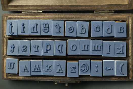 wood stamp alphabet close up image for background. photo
