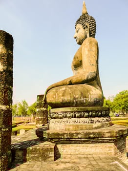 Old oriental statue photo