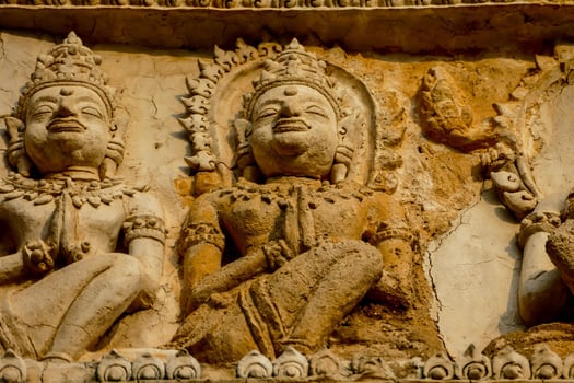 Old oriental statue photo
