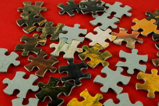 Puzzle pieces on the table photo