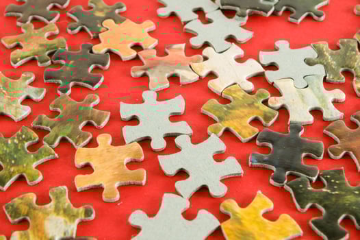 Puzzle pieces on the table photo