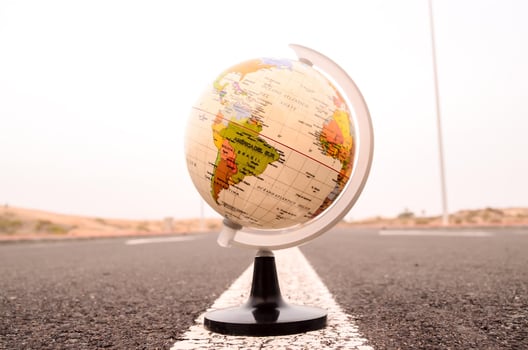 Globe on the road photo
