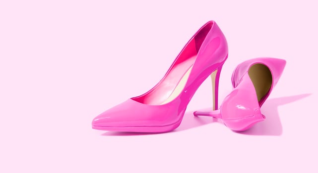Woman Shoes Banner. High heels closeup. Top view. Women fashion. Ladies accessories. Girly casual formal shoe isolated. pink background. Footwear on floor. Copy space, mockup. flat lay Selective focus photo