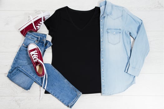 T shirt black and sneakers. T-shirt Mockup flat lay with summer accessories. Jeans and sneakers on wooden floor background. Copy space. Template blank canvas. Front top view. photo