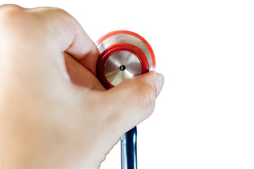 Closeup and crop hands of human holding a small doctor stethoscope on white background and make with path. photo