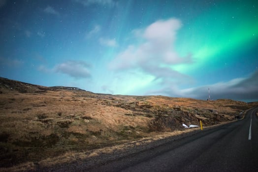 The beautiful Aurora borealis over the night sky in Iceland. photo