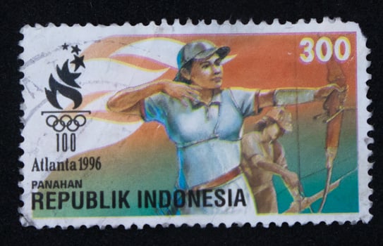 Sidoarjo, Jawa timur, Indonesia, 2022 - philately, a collection of stamps with the theme of a woman participating in the archery atalanta olympics photo