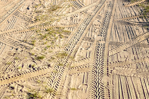 traces and footprints on sand country road photo