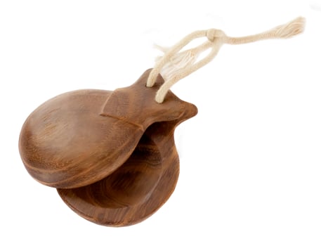Spanish castanuelas on white background photo