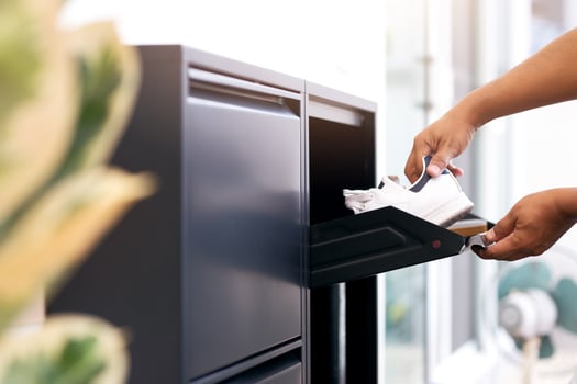 The man opened black steel shoes storage cabinet to keep her shoes photo