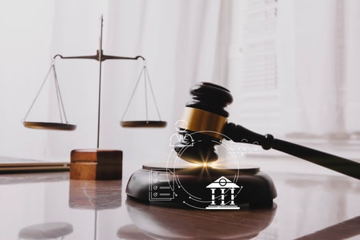 Business and lawyers discussing contract papers with brass scale on desk in office. Law, legal services, advice, justice and law concept picture with film grain effect photo
