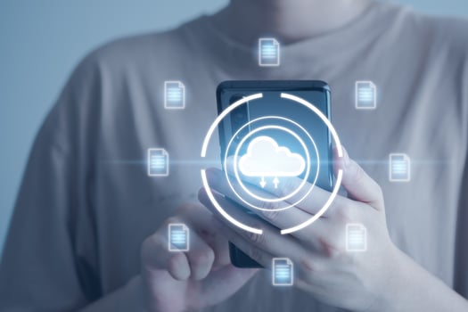 Document Management System, DMS, online documentation database and process to efficiently manage files. Cloud technology. Data storage. Hand using mobile smartphone for get document from cloud. photo