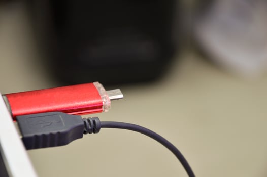 The USB Flash Drive is a storage device, the USB Garage is red. photo