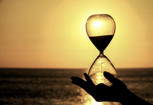 A beautiful sunset and an hourglass photo
