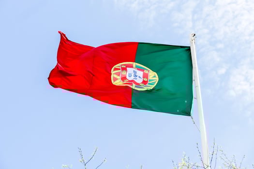 portugal flag on the blue sky photo