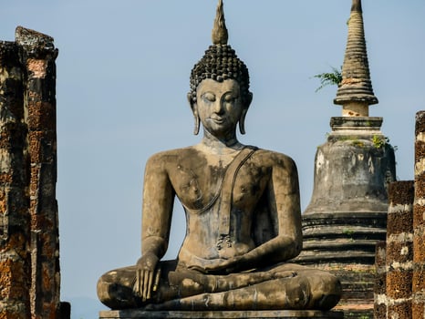 Buddhist sculptures at a temple in Bangkok, Thailand photo