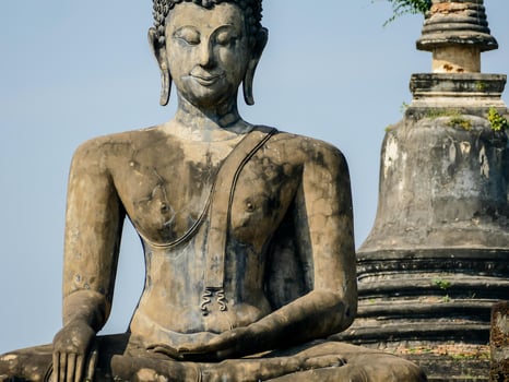 Buddhist sculptures at a temple in Bangkok, Thailand photo