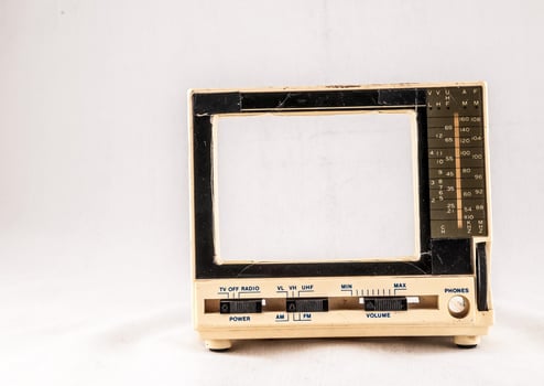 an old television with a white background photo