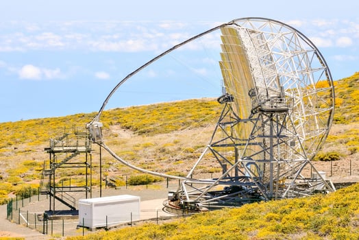an antenna on top of a hill photo