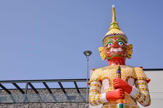 a large statue of a man with a sword photo