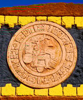 the aztec seal on the wall of a building photo