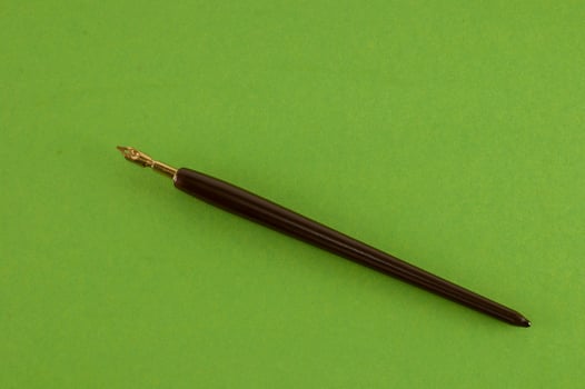 Pen on green background photo