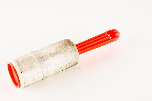 Paint roller on white background photo